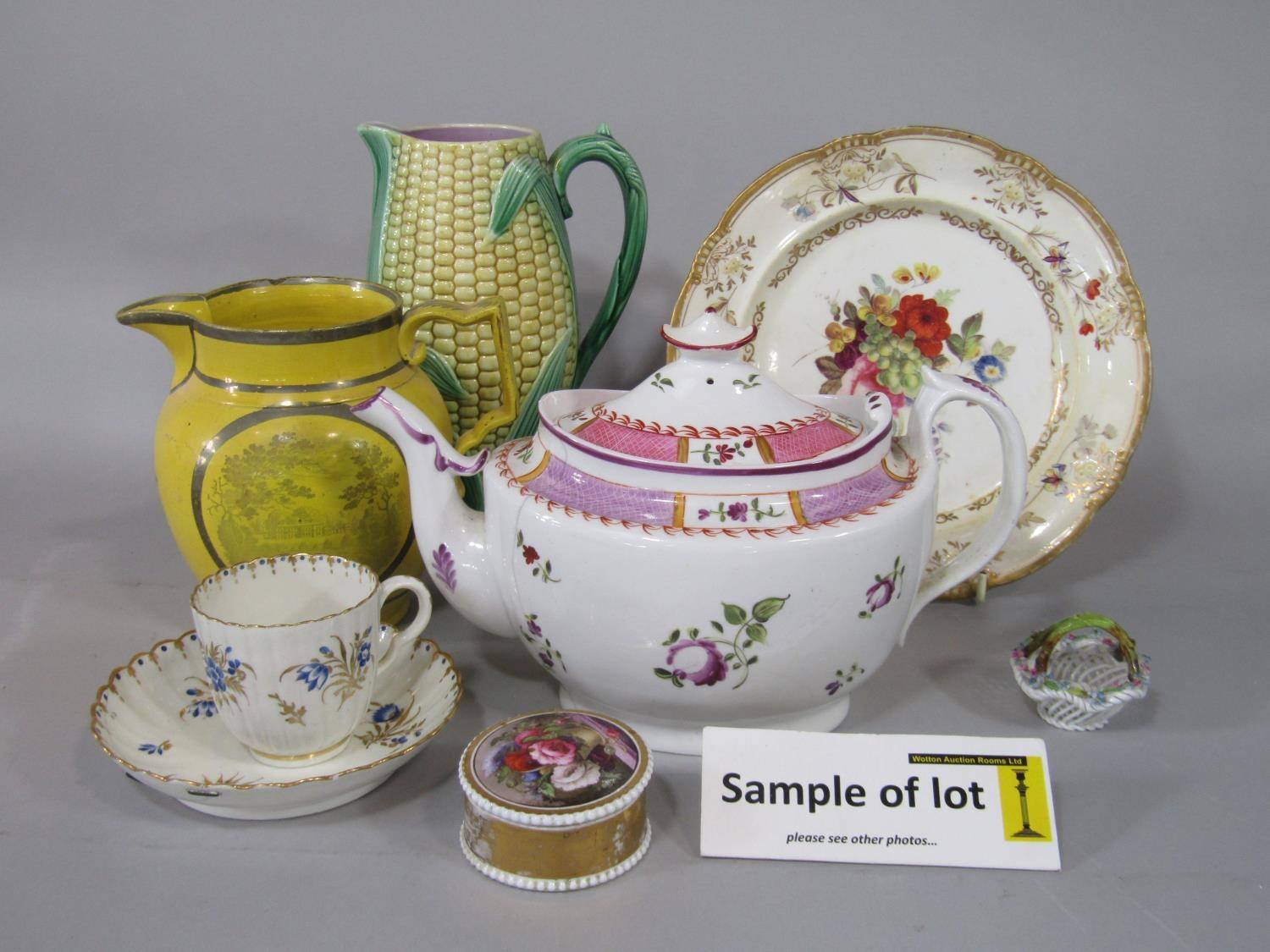 A collection of late 18th and 19th century ceramics including tea bowls and saucers, a majolica