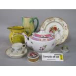 A collection of late 18th and 19th century ceramics including tea bowls and saucers, a majolica