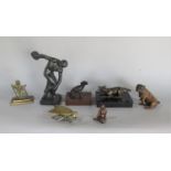 A collection of cast metal figures to include a classical Grecian standing figure, a fox with