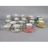 A collection of Wedgwood teawares with strawberry decoration comprising covered two handled sugar