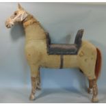 Impressive folk art straw stuffed hessian and pine study of a standing horse, with leather saddle,