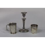 Two silver cups, one with darted band, the other with handle, 6.5 oz approx, together with a further