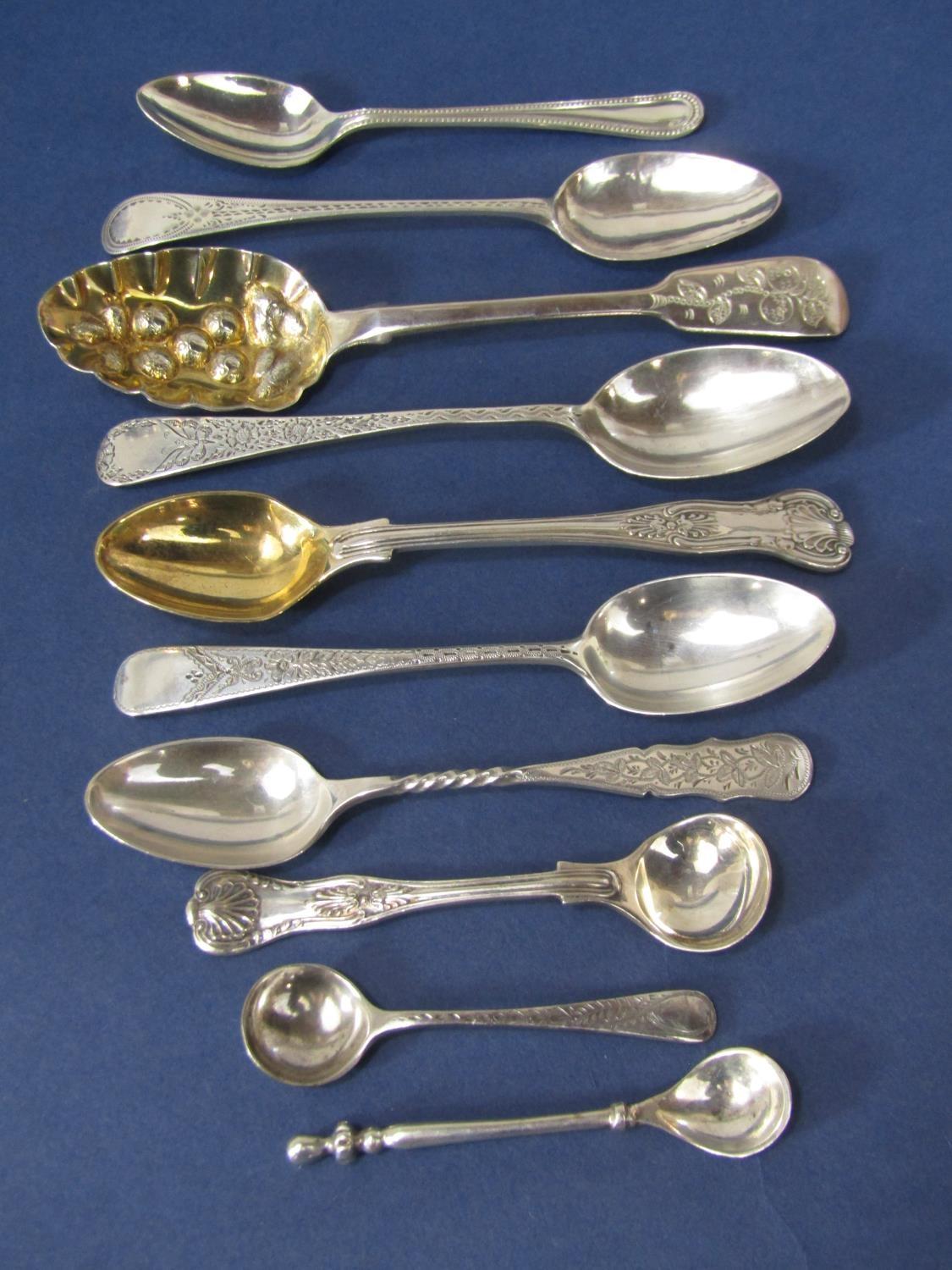 A collection of good antique silver spoons to include bright cut, beaded and Kings pattern examples,