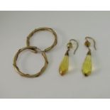 Pair of antique 9ct briolette cut citrine drop earrings, together with a pair of 9ct hoop earrings
