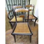 Three Regency sabre leg dining chairs (2 + 1) in beechwood and rosewood with inlaid detail, cane