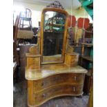 A good quality 19th century continental mahogany dressing table, the low set base of concave form,