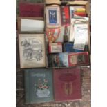 A box containing a mixed collection of items to include two postcard albums, vintage maps and