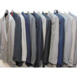 A collection of 14 fine wool tailored suits including suits by Brioni, Jean Jacques, Lanvin. Most