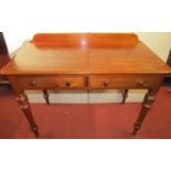 A Victorian mahogany and pine side table, fitted with two frieze drawers on four turned supports