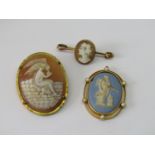 Yellow metal Wedgwood Jasperware pendant set with seed pearls (loop vacant), together with a