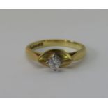Stylised 18ct diamond solitaire ring, Birmingham 1992, size O, 4.5g