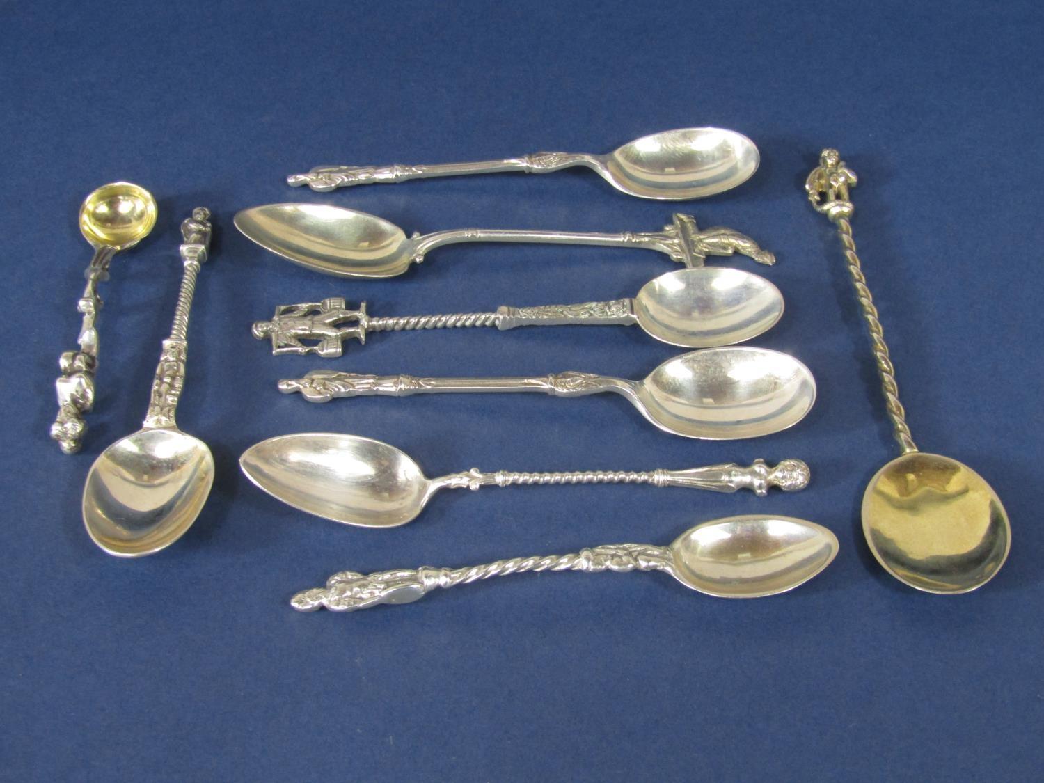 Collection of silver apostle type spoons to include novelty examples, 4 oz approx (9)