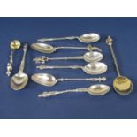 Collection of silver apostle type spoons to include novelty examples, 4 oz approx (9)