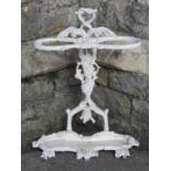 A cast iron two divisional umbrella stand with naturalistic simulated fruiting grape and vine detail