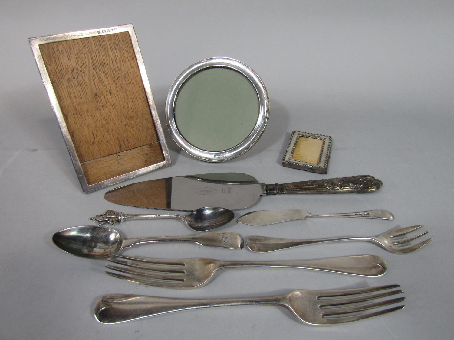 Mixed lot of silver comprising a pair of Victorian table spoons, butter knife, teaspoon, souvenir