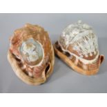 Two similar carved cameo conch shells, one with a row of robed maidens over a floral spray,