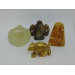 Chinese jadeite snuff bottle, another and a small carved stone panel depicting a Buddhist figure and