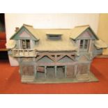 A 19th century home made folk art toy stable and living accommodation, with original dry painted
