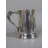1920s silver christening cup/small tapered tankard upon a stepped circular base, with beaded S