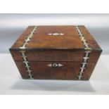 19th century burr walnut and mother of pearl inlaid dressing box, the hinged lid enclosing a