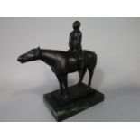 After Marini - Bronze character group of a man riding a horse, the base inscribed F Preis upon a