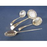 Four various silver sifter spoons to include a Georgian example, 2.5 oz approx (4)