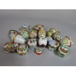 A collection of enamel pill and trinket boxes, mostly by Halcyon Days Enamels including Easter