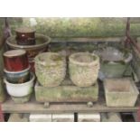 One lot of contemporary partially weathered cast composition stone garden planters and flower