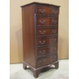 A small reproduction mahogany veneered chest in the Georgian style, the serpentine front fitted with