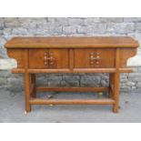 A Chinese elm alter table with through jointed and moulded framework, enclosed by four doors with