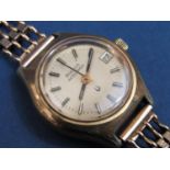 Vintage ladies Bulova Accutron gold plated wristwatch, the champagne dial with baton markers and