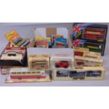 Collection of boxed model buses, including London Double Deckers by Solido, others by Lledo,