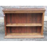 A sturdy country made elm and pine open shelving unit with tongue and groove boarded back, 105 cm