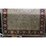 Large Turkish Caucasian carpet with various floral sprays upon a ivory ground, 360 x 275cm