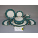 A collection of dinnerwares retailed by T Goode & Co of London, with speckled teal coloured border