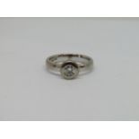 18ct white gold bezel set diamond solitaire ring, the stone 0.25cts approx, size K/L, 4.8g
