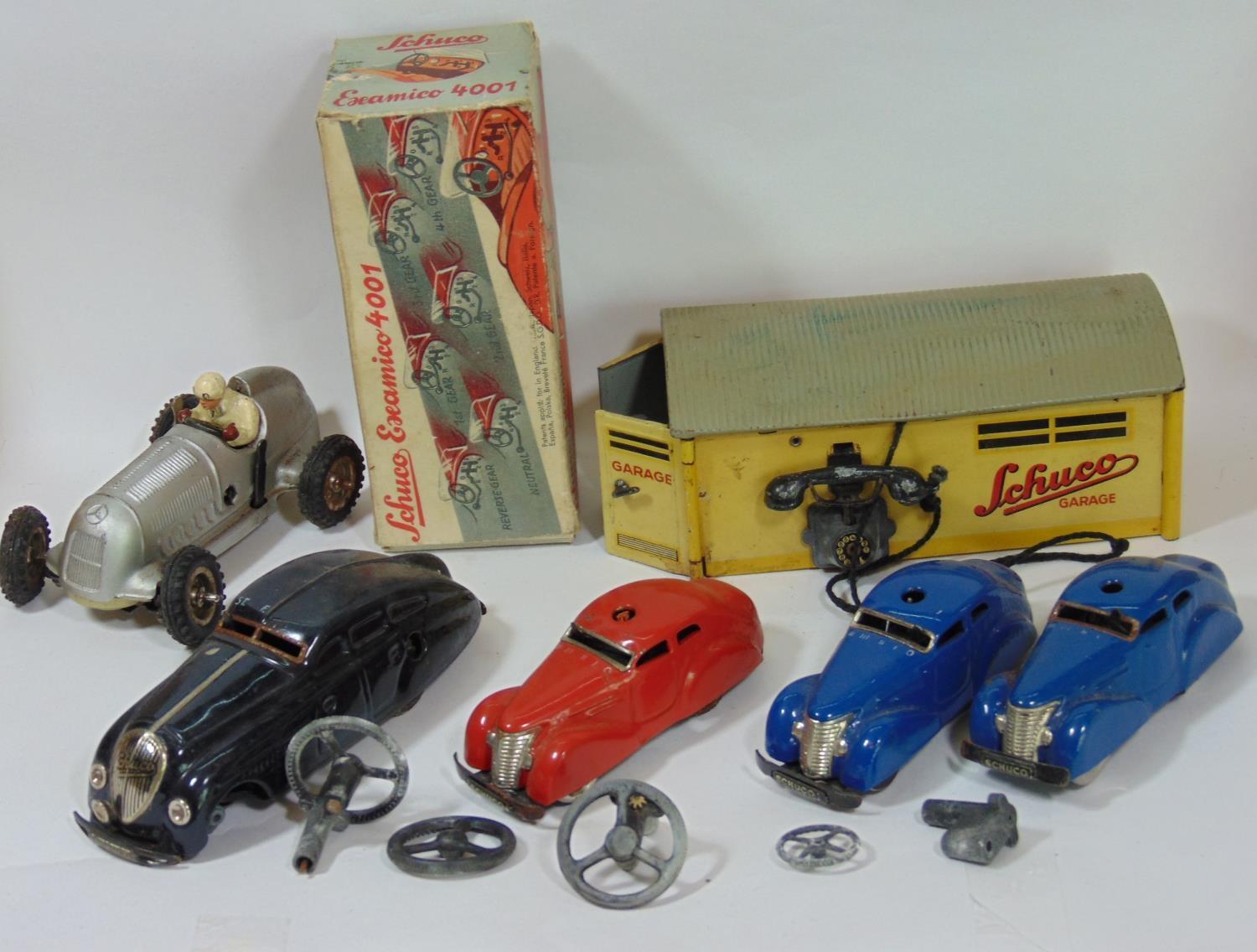 Collection of clockwork cars by Schuco and Gescha including a boxed Schuco Examico 4001, a Schuco