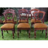 A set of six Victorian mahogany balloon back dining chairs with moulded frames, upholstered drop-