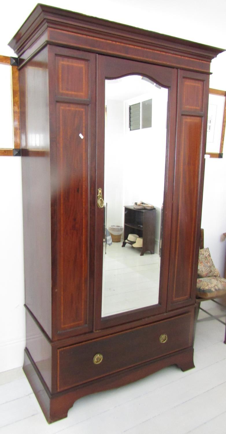 A good quality inlaid Edwardian mahogany single wardrobe with satinwood crossbanded detail,