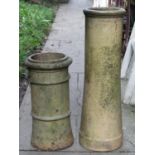 Two reclaimed buff coloured chimney pots of cylindrical form (varying design and height), the