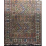 Afghan rug with various blue and green geometric panels upon a washed orange ground, 200 x 110cm,
