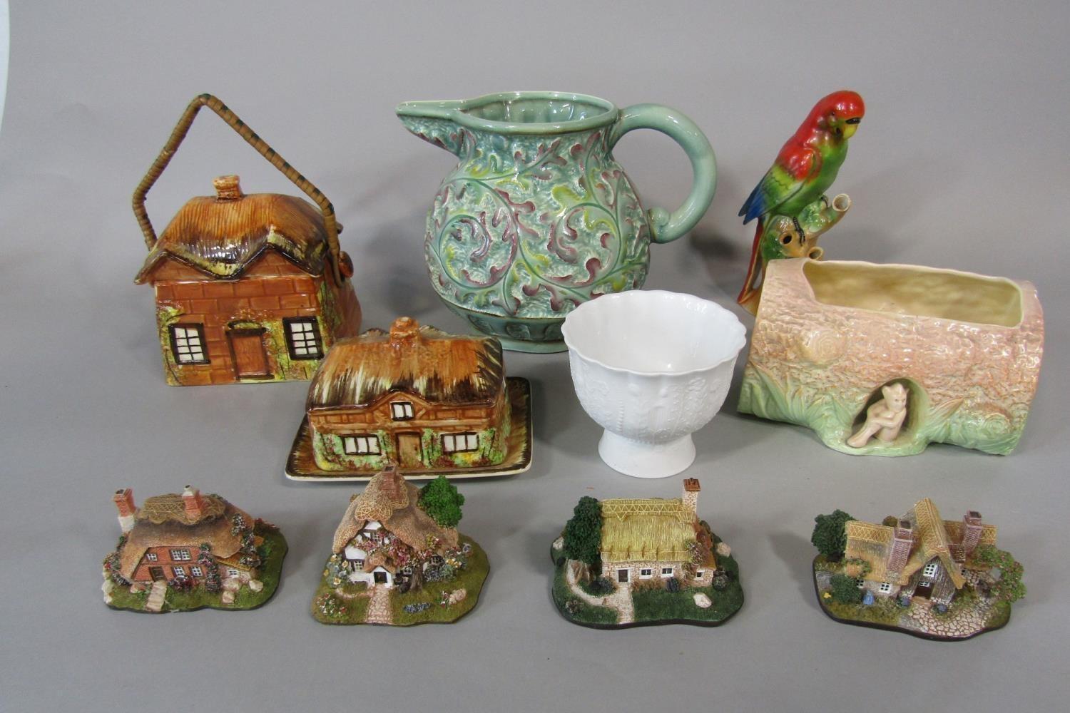 A collection of ceramics including a Beswick ware green ground jug, with impressed numbers to base