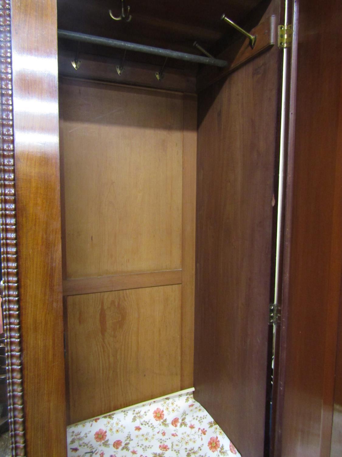 A good quality Victorian mahogany triple wardrobe, the central mirror panelled door flanked by two - Image 5 of 6