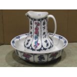 A Losol ware Dormer ceramic jug and basin with transfer printed floral detail