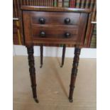 A small Georgian rosewood ladies sewing table, enclosing a single deep frieze drawer (disguised as