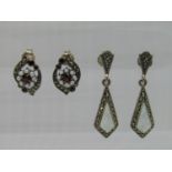 Five pairs of contemporary silver earrings to include a tapered pair set with opals and a further