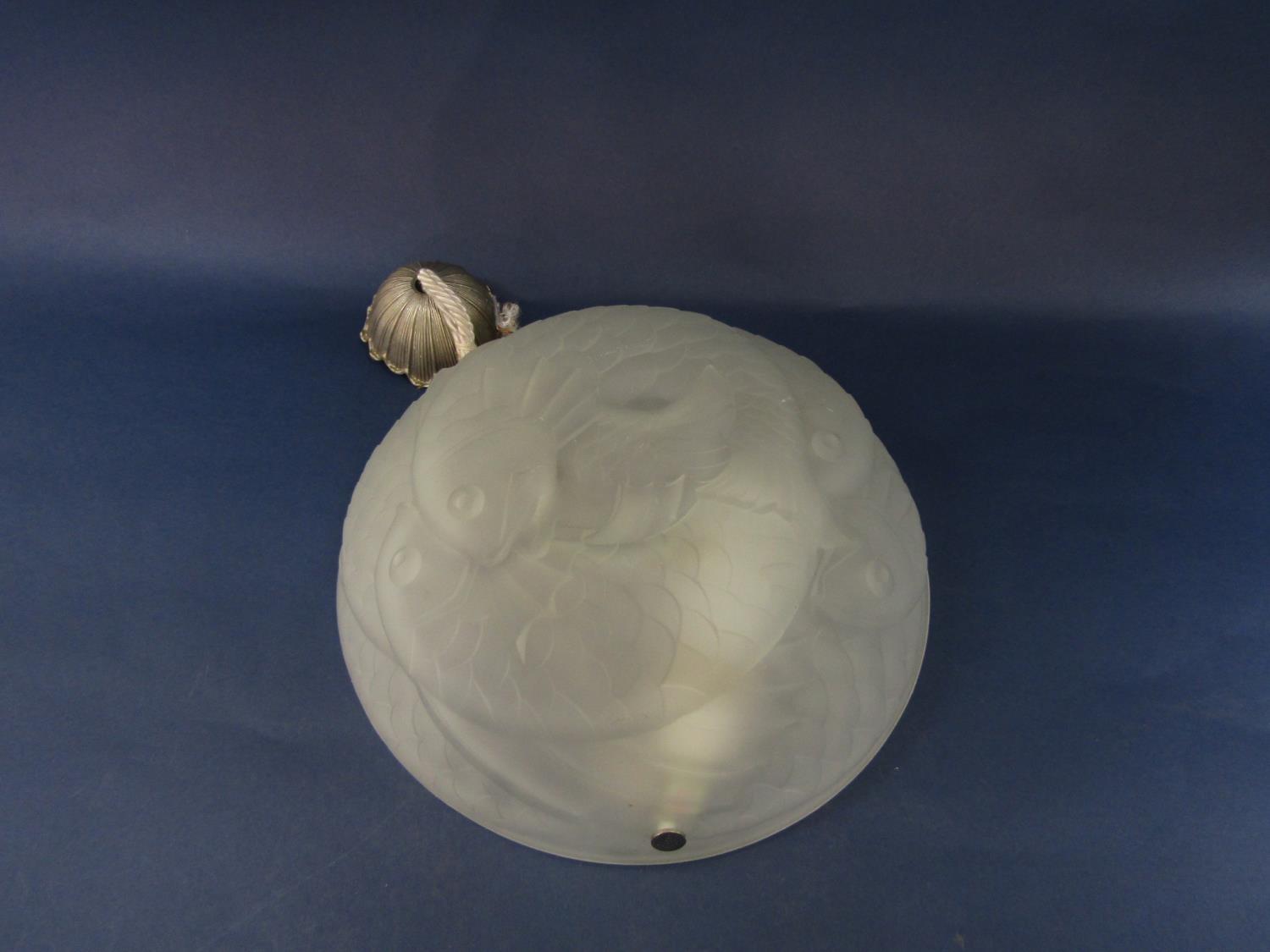 Opaque pressed glass ceiling light in the manner of Lalique decorated with overlapping fish, 33cm