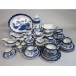 A collection of Booths Real Old Willow pattern blue and white printed wares comprising a bowl of