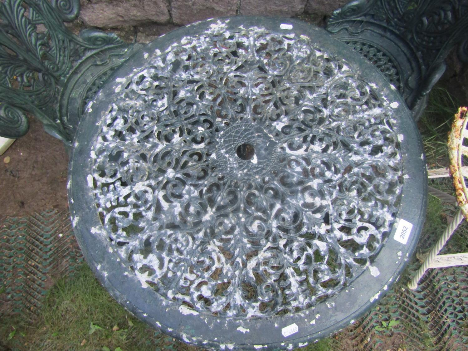 A cast aluminium garden terrace table of circular form with decorative pierced top and weathered - Image 3 of 3