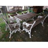 A good quality five piece garden suite in the Coalbrookdale manner, comprising rectangular table,
